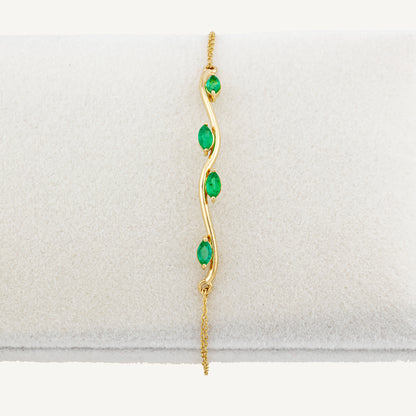 18K Yellow Gold Emerald Swirl Bracelet with Natural Green Emeralds