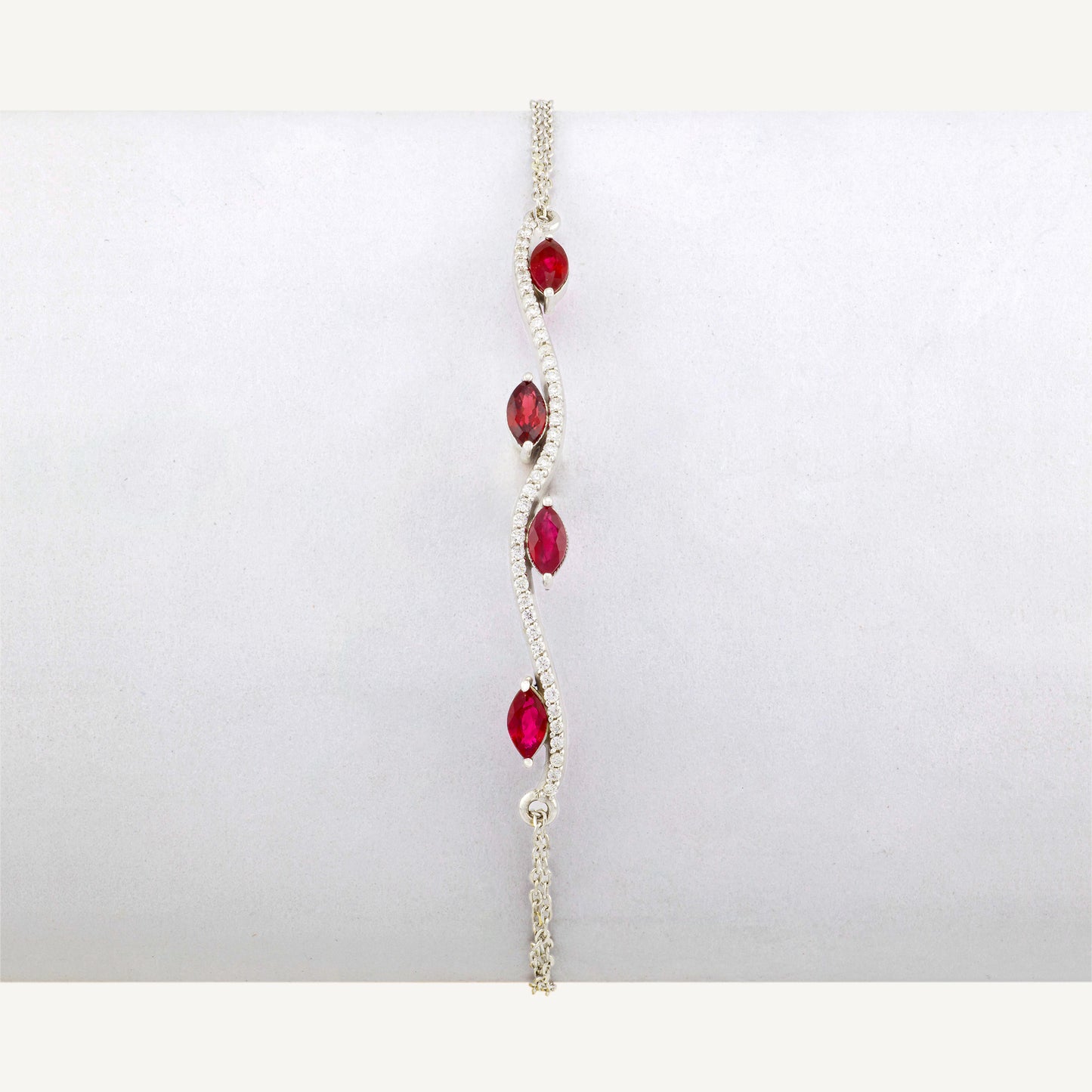 18K White Gold Ruby Swirl Bracelet with Natural Red Rubies and Diamonds